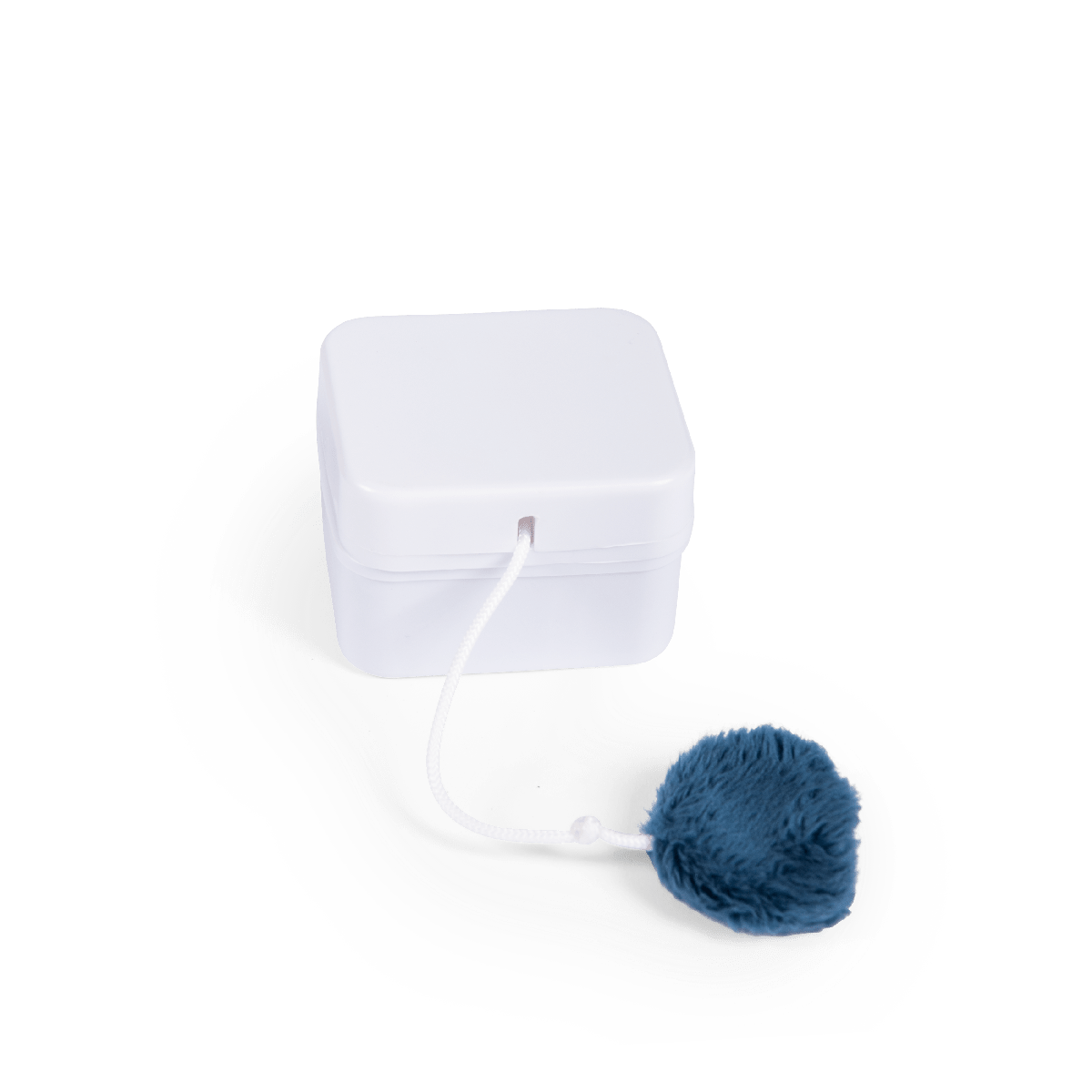 White square music box unit with dark blue faux fur pull string