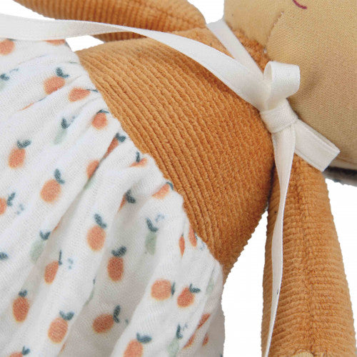 Close-up of Kaloo Eloise tan corduroy texture and satin ribbon detail