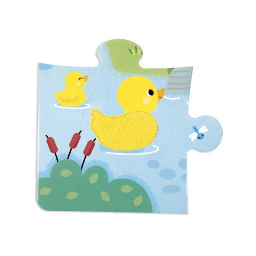 Yellow duck tactile puzzle piece with fibrous water texture