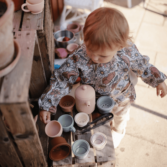 Bavoir manches longues – Fleurs rétro