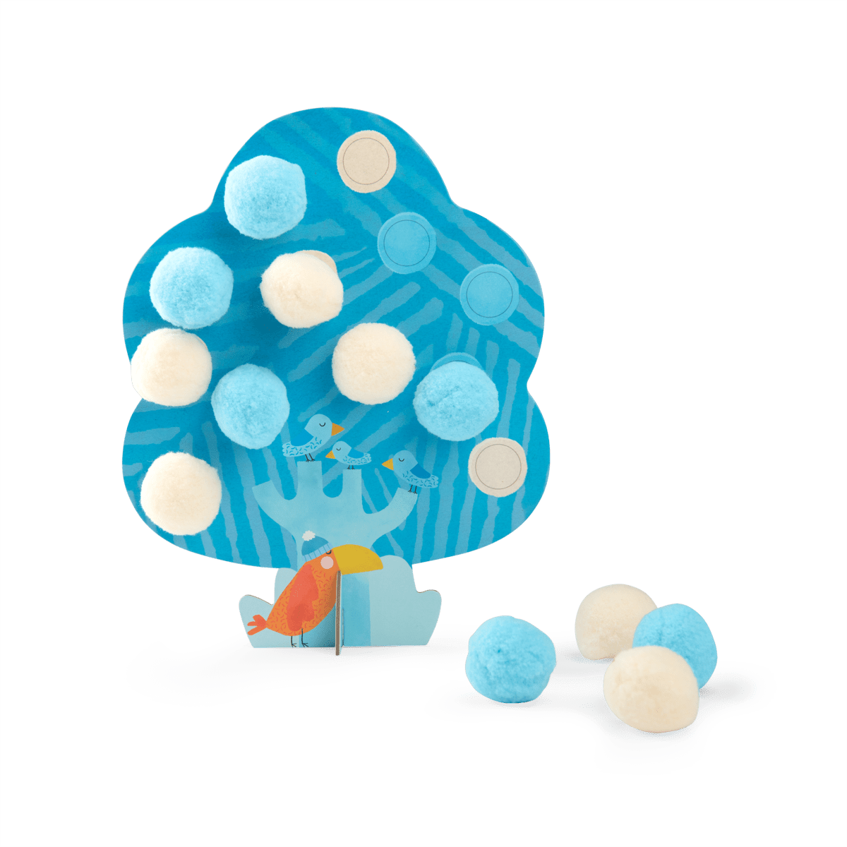 Blue winter themed cardboard tree from Les Toupitis set decorated with light blue and white pom-poms