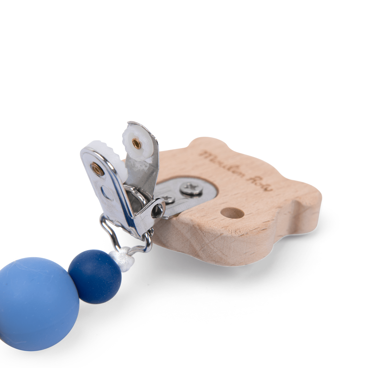 Close-up of Moulin Roty wooden pacifier clip safety padding