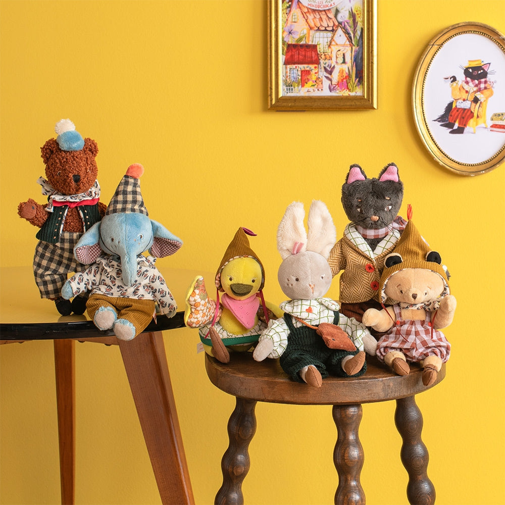 Collection of Moulin Roty articulated plush toys including Baba bear on stools