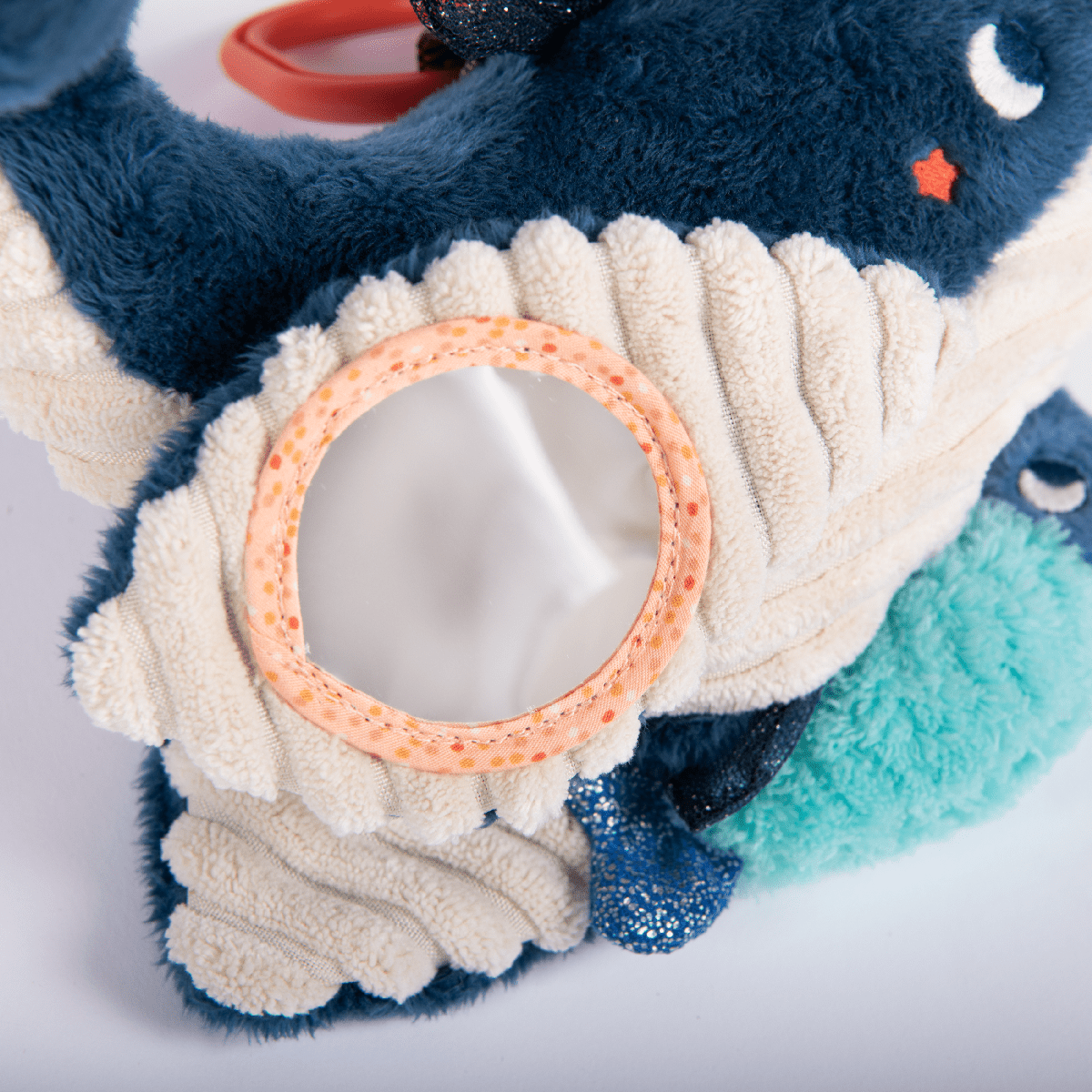 Paulie musical whale plush with hidden mirror and textured belly