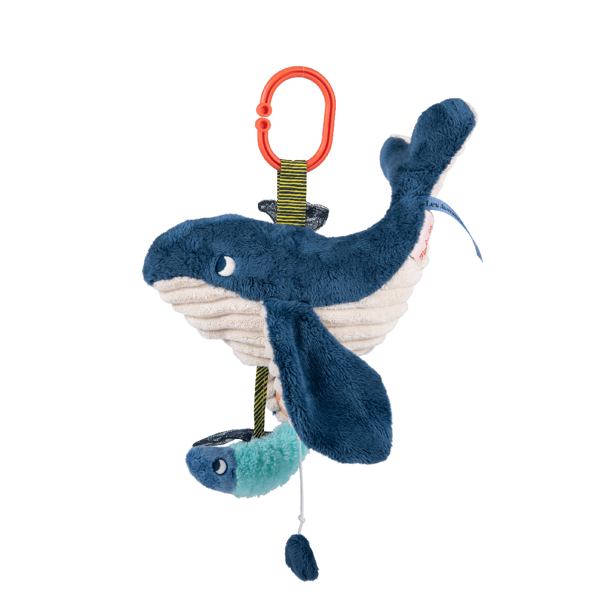 Side view of hanging whale plush with attached fish and pom-pom