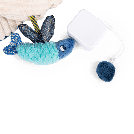 Detachable music box mechanism with blue pom-pom for Paulie toy