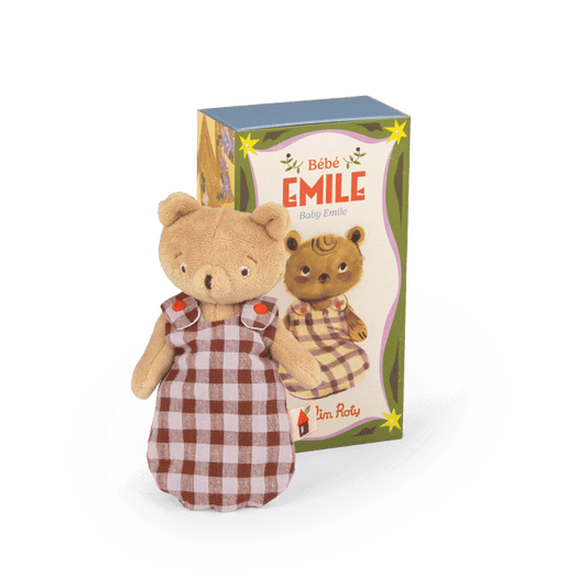 Bébé Emile plush toy in removable gingham swaddle standing by Moulin Roty box