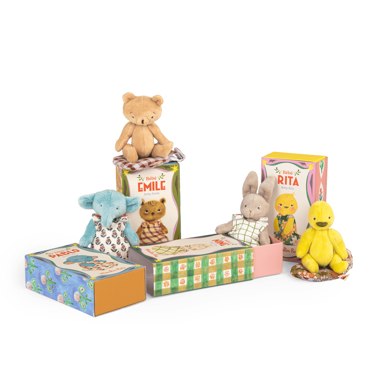 Moulin Roty Bébé collection display featuring Emile, Pablo, Nino, and Rita toys