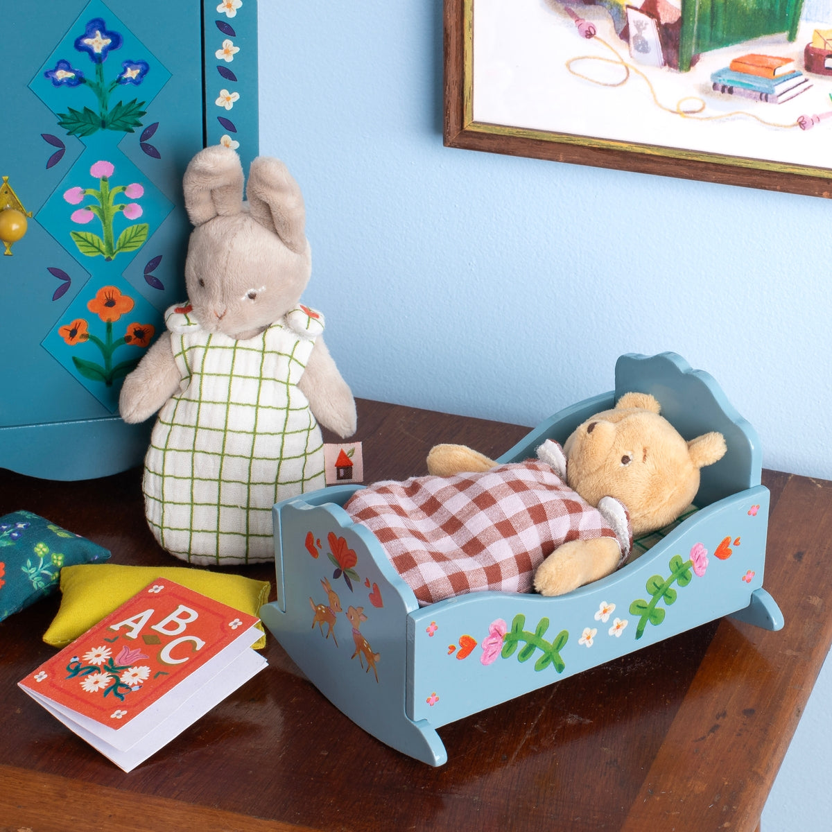 Bébé Nine rabbit doll styled with miniature wooden rocking bed and ABC book