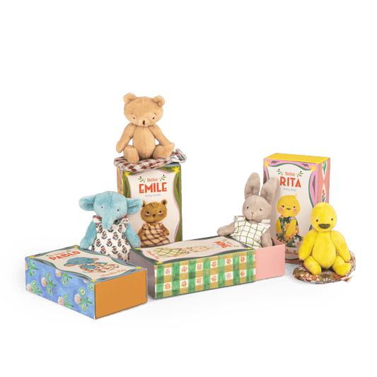 Moulin Roty baby plush toy set including Pablo, Emile, Rita, and duckling