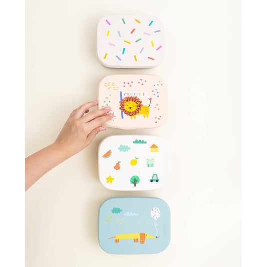 Stack of three removable silicone lunchbox lids with animal prints