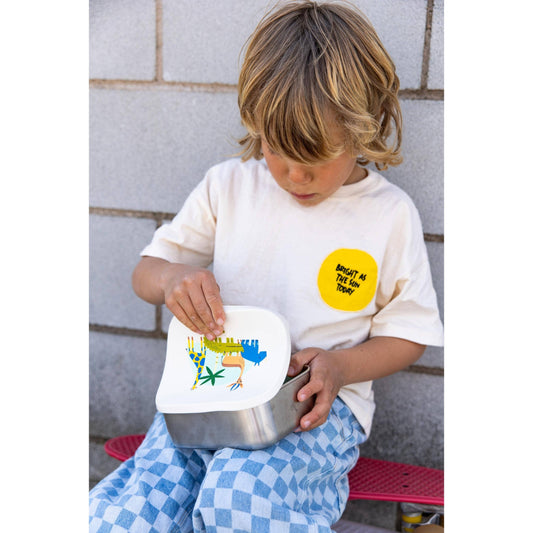 Open stainless steel lunchbox showing removable silicone compartments