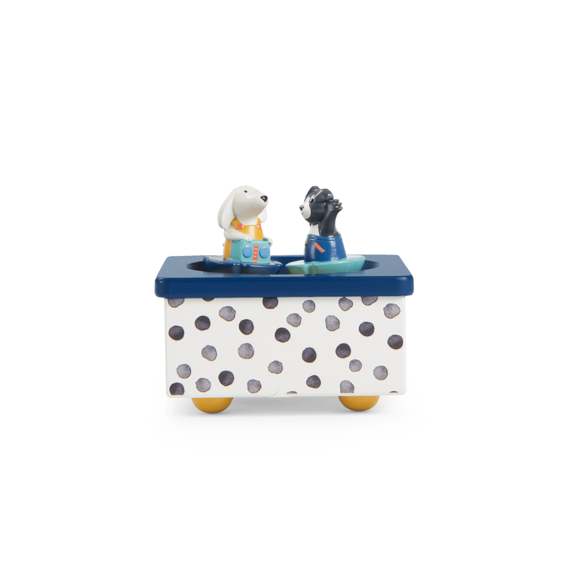 Front view of white and navy polka dot music box