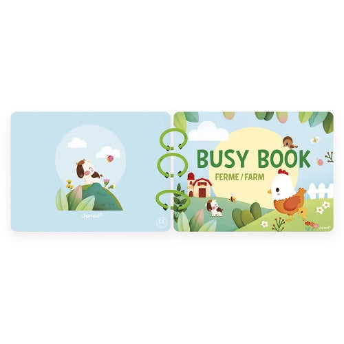 Janod Farm Busy Book cover featuring cow barn sun and green spiral binding