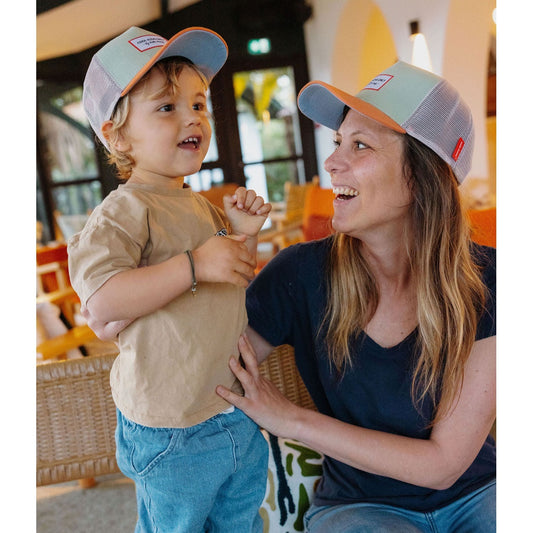 Mother and son modeling light green and orange Hello Hossy kids trucker hat