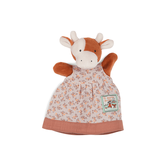Brown and white cow hand puppet with floral dress by Moulin Roty