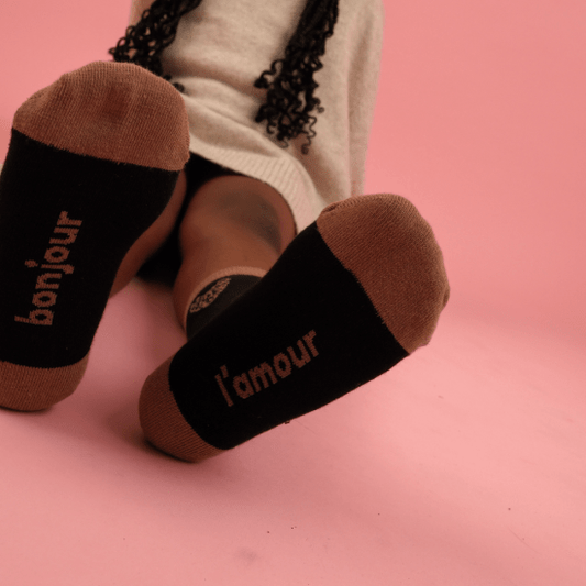 Chaussettes enfant noires et léopard marron