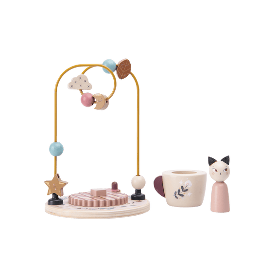 Disassembled parts of Moulin Roty wooden bead maze toy