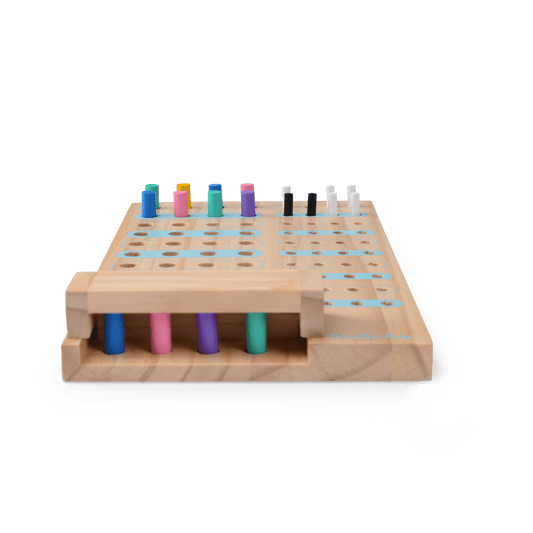 Moulin Roty wooden logic board game with colored pegs for family strategy play