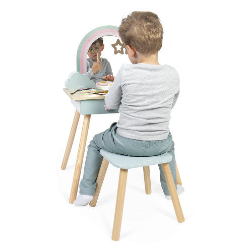 Child playing at Janod wooden unicorn vanity set with stool and star wand