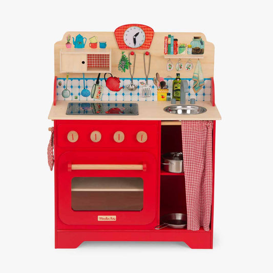 Front view of Moulin Roty red wooden play kitchen with tiled backsplash