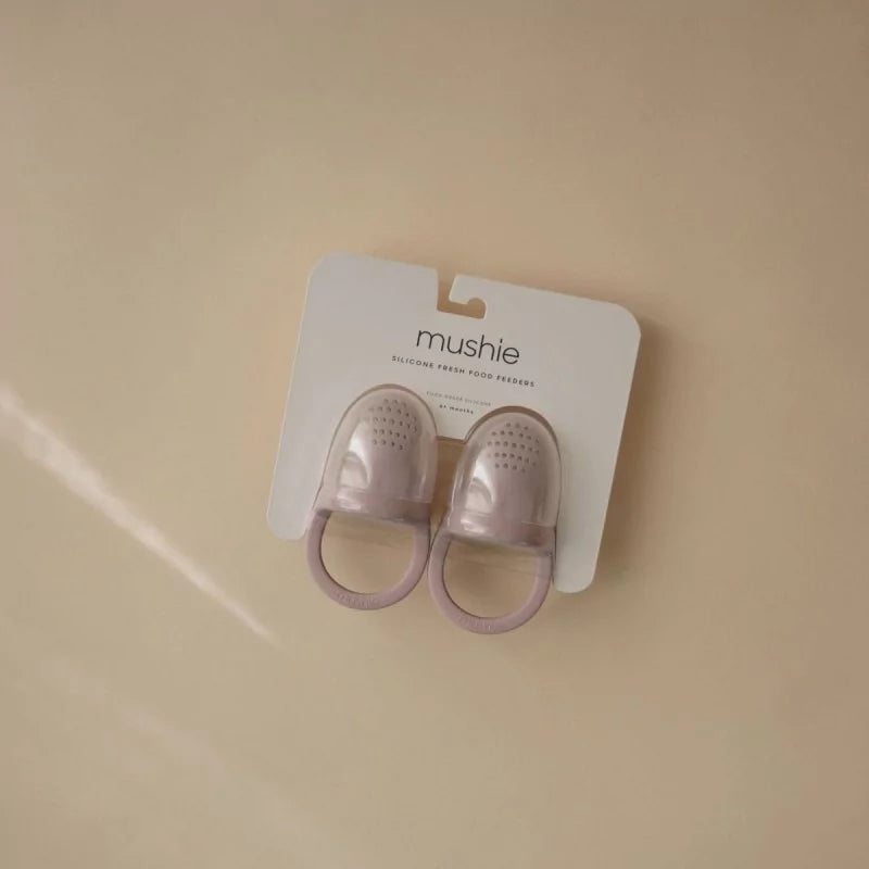 Pack of two MUSHIES soft lilac silicone baby food feeders with label