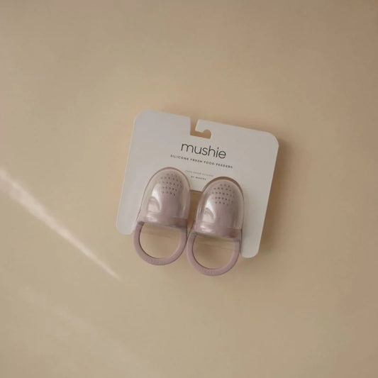 Pack of two MUSHIES soft lilac silicone baby food feeders with label