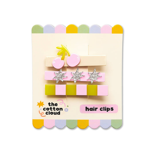 Cerise Pop hair clips set with cherry and star charms on display card