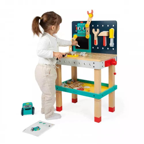 Child drawing on JANOD robot workbench chalkboard panel with magnetic tools