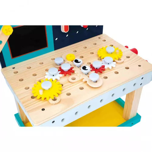 Colorful plastic gears and knobs on JANOD wooden robot workbench tabletop