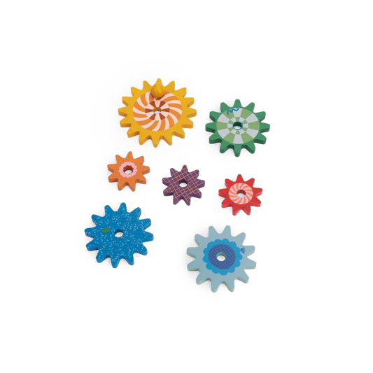 Close up of seven colorful painted wooden gears from the Les Toupitis motor skills toy set