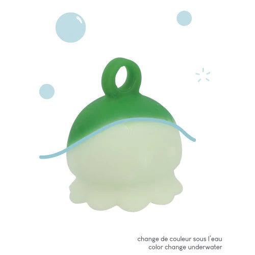 Green and white color changing octopus bath toy underwater effect