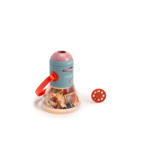 Light blue Moulin Roty story lantern with pink ribbed top, red handle, and control buttons displayed
