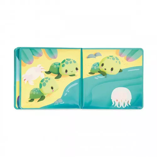 Open Janod bath book showing turtles and crab on beach underwater pages