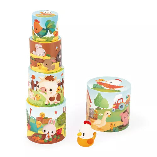 Disassembled wooden farm animal stacking rings with hen figurine