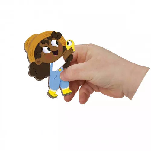 Close-up of child farmer magnet piece with yellow hat and chick