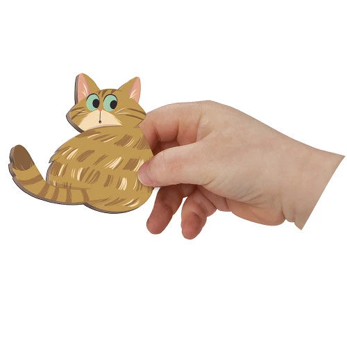Hand holding orange tabby wooden cat magnet showing thickness and smooth edges