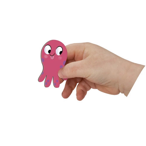 Close-up pink octopus magnet held in child hand showing scale and detail