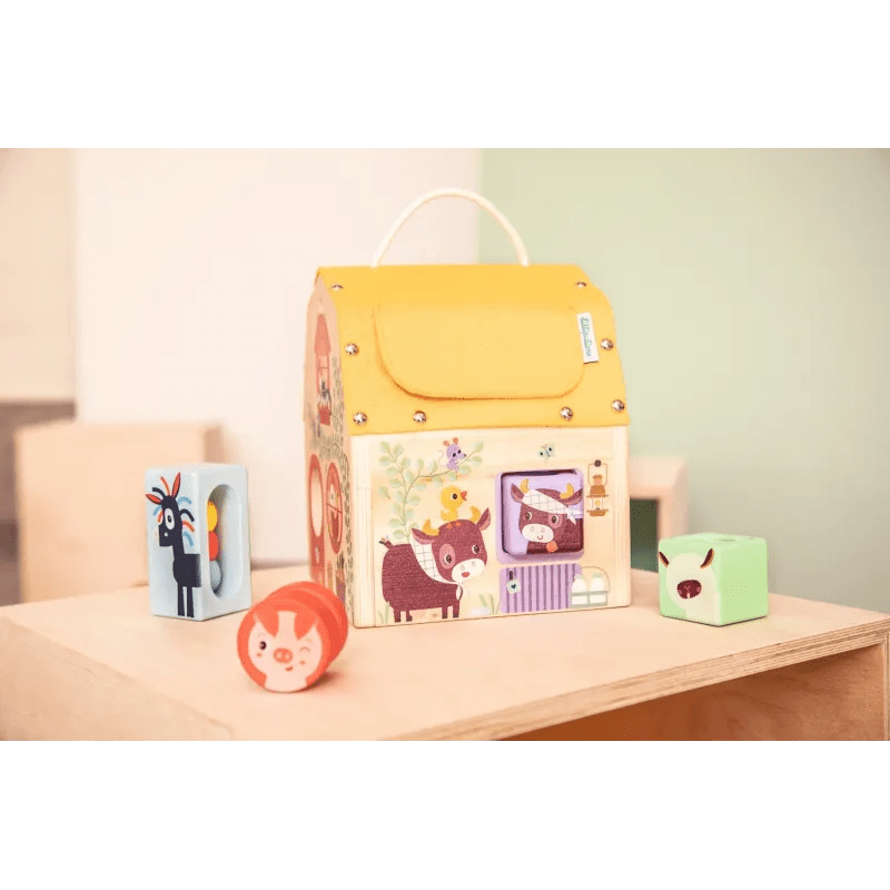 Farm animal shape sorter toy with colorful wooden blocks and musical sound module