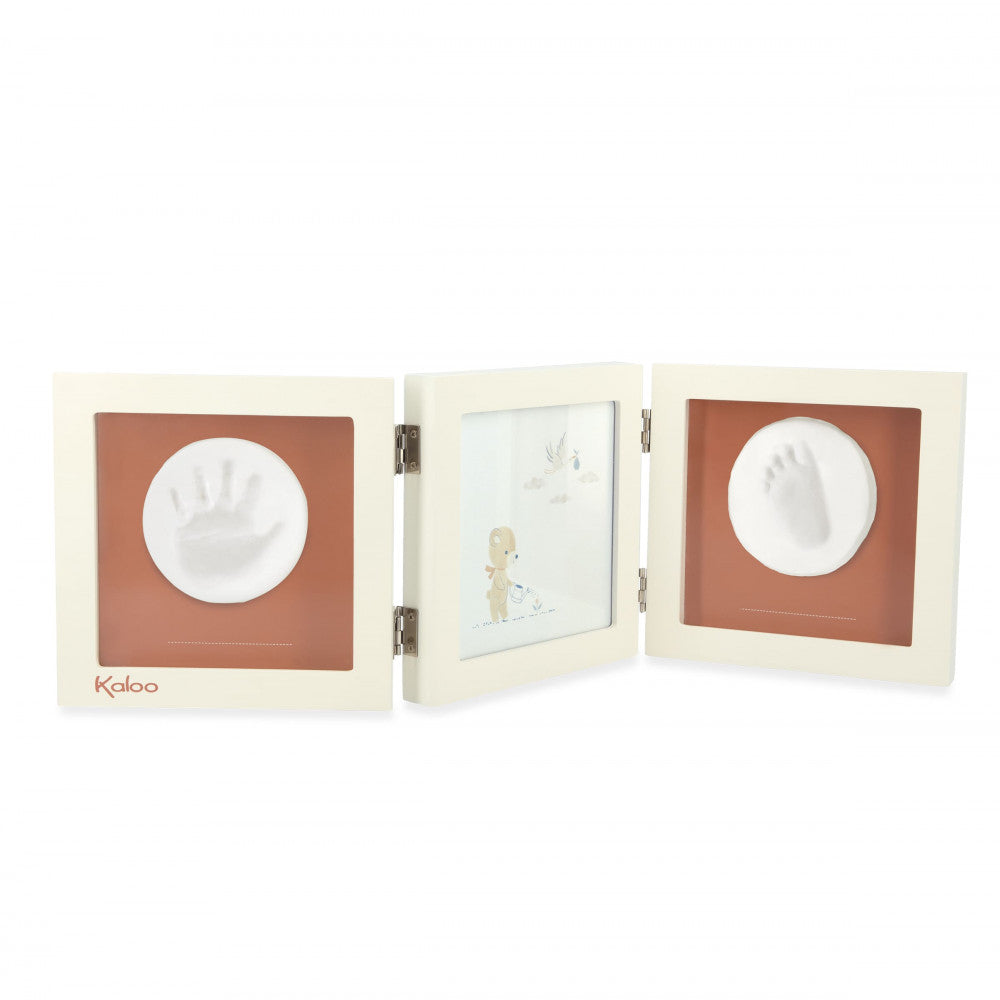 Open wooden triptych frame displaying handprint, bear photo, and footprint