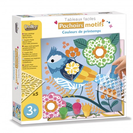Child using spring bird stencil set with paint pots to create colorful artwork