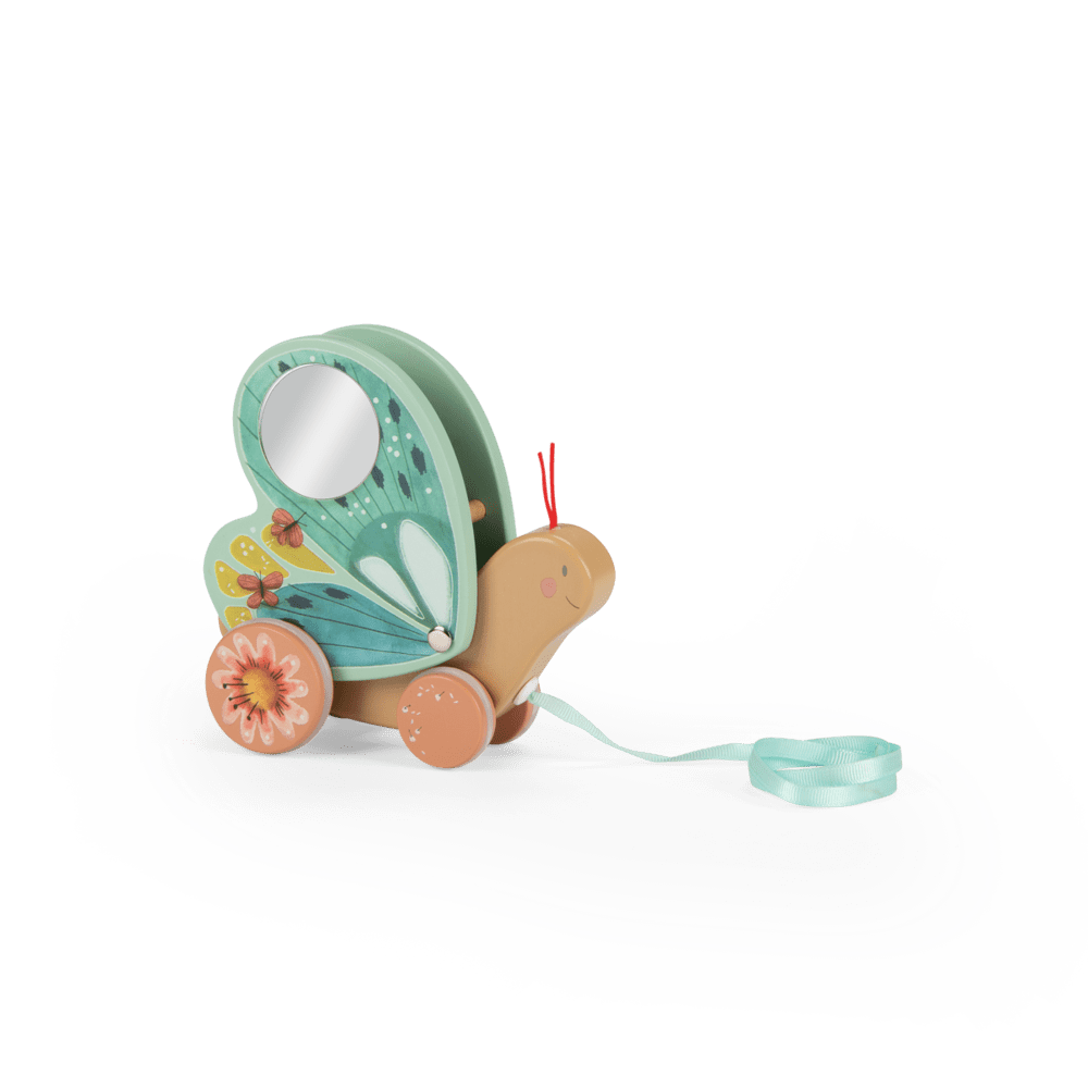 Front view of wooden butterfly pull toy showing tan head, mirror insert, and floral wheels