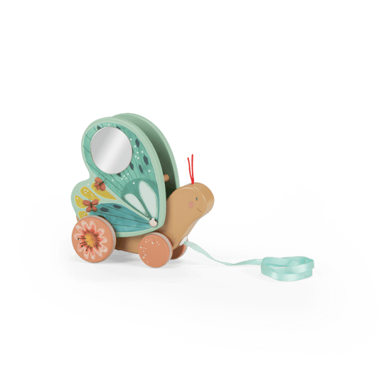 Front view of wooden butterfly pull toy showing tan head, mirror insert, and floral wheels