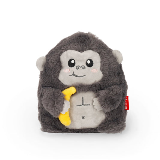Front view of small grey plush gorilla clutching banana