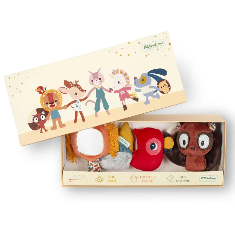 Open Lilliputiens sensory discovery box showing sight touch hearing icons and plush toys