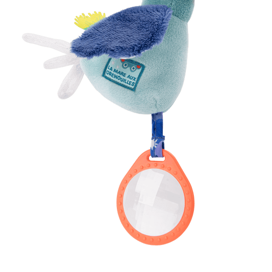Close-up of La Mare aux Grenouilles label on bird plush belly