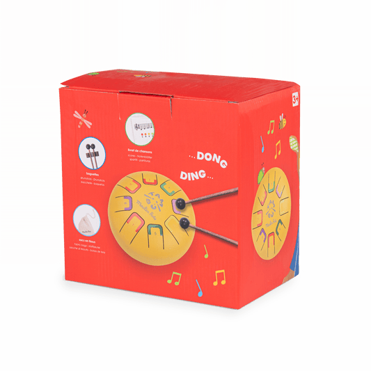 Red Moulin Roty packaging box for small tongue drum set