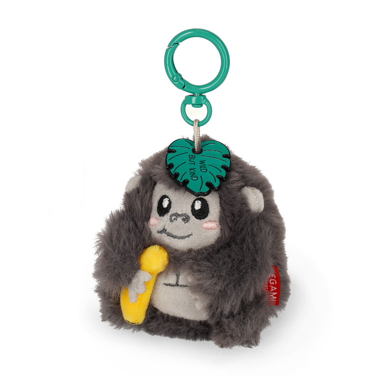 Close-up of grey plush gorilla keychain texture and embroidered face details