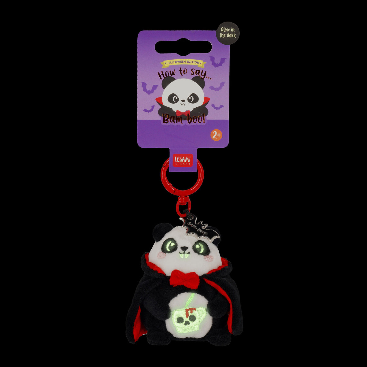 Glowing green skull cup on Halloween panda keychain