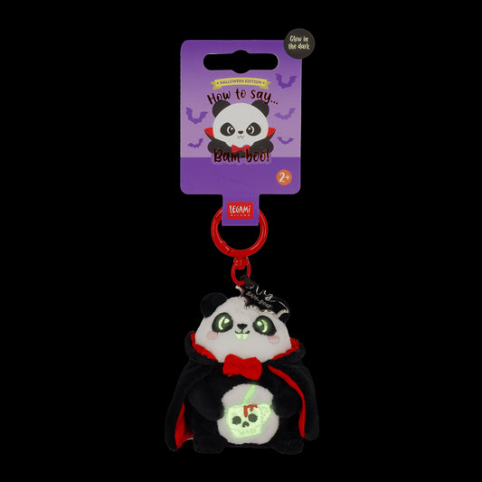 Glowing green skull cup on Halloween panda keychain